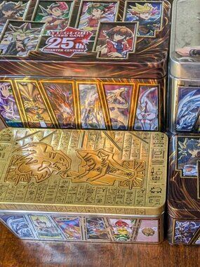 Yu-Gi-Oh! TCG: 25th Anniversary Tin Dueling Heroes Mirrors. 4 TINS NO CARDS